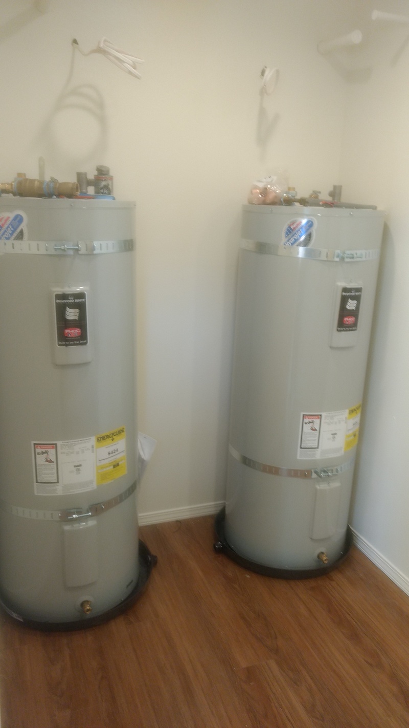 Hot water heaters are in place, ready to be connected.