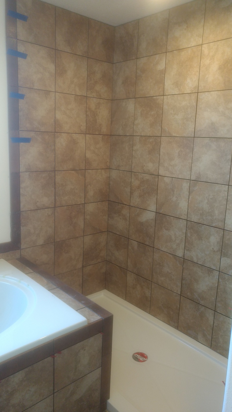 rm5b: Master Shower, tile not yet grouted.