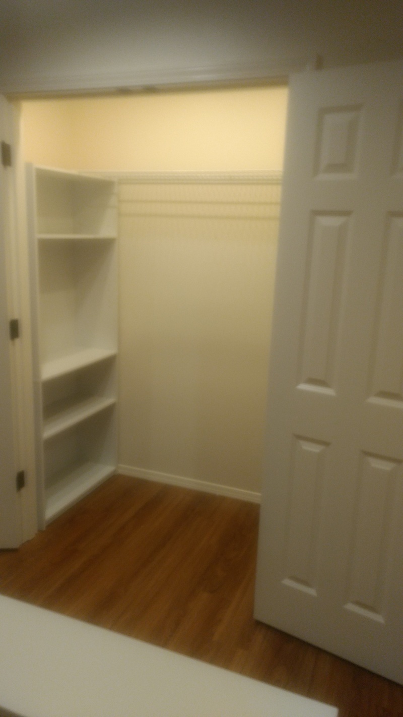 The upper linen closet, left wall.
