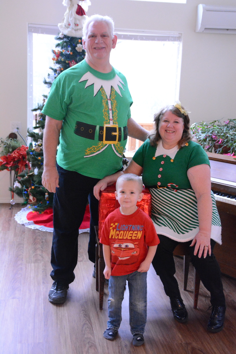 Santa's Elves Don and Lois with Austin.