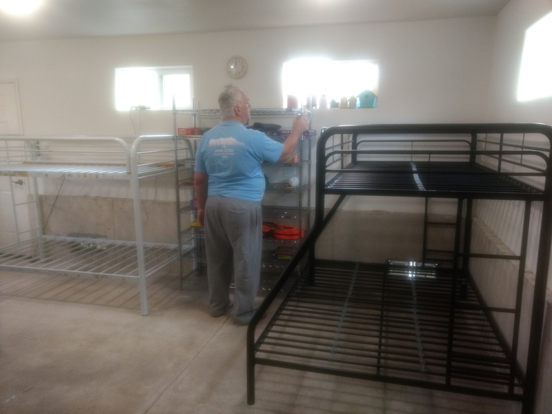 Don and Lois put together a white bunk bed that we bought.