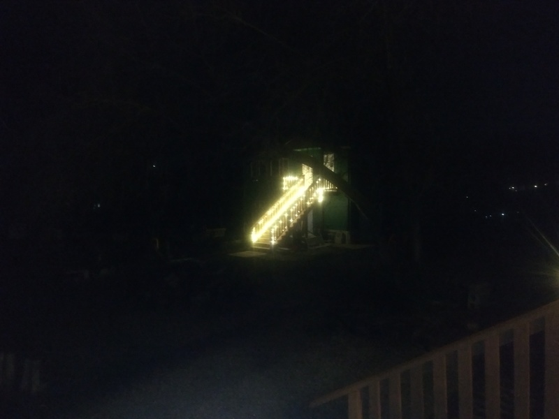 Lighting the Way: Don installed screw hooks and warm white LED lights on the east stairs and deck of our guest house. At the top of the stairs is our "outside bathroom". The lights are on a photocell timer to come on at dusk and stay on for a certain number of hours.