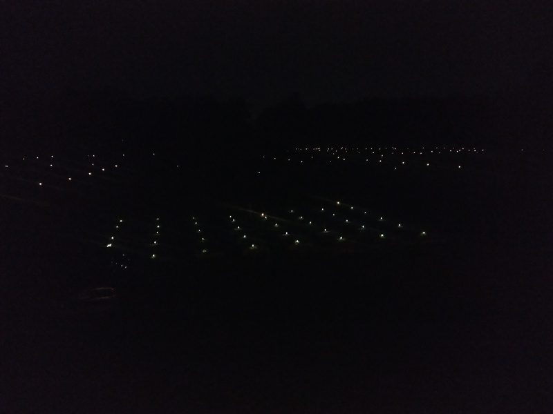 Solar LED "stick" lights are atop about half of our T-Posts which surround the pastures. This night-time view from the rm6b balcony kind of shows the sweep of our seven acres.