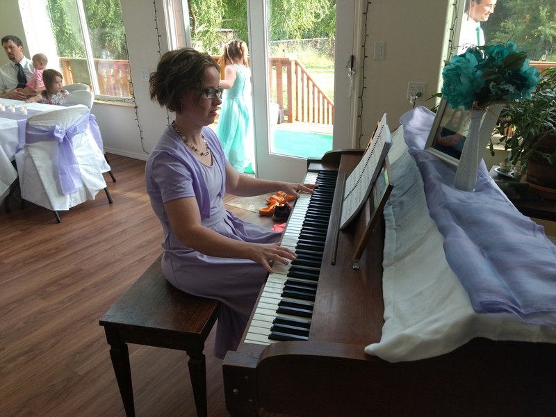 Sister playing the piano.