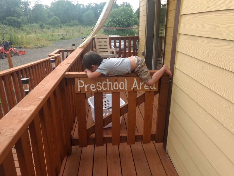 Calvin crosses the Preschool Area gate.