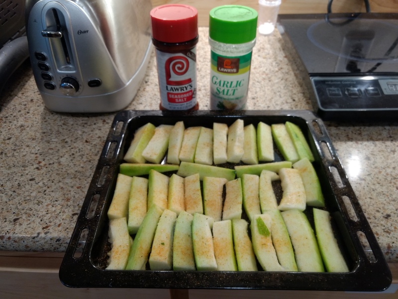 Making zucchini sticks. They tasted good, but were too wet.
