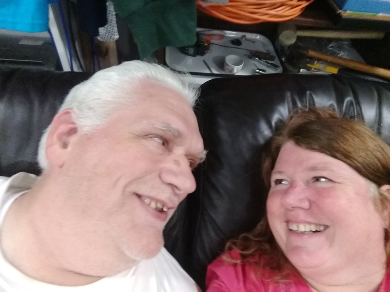 Don and Lois taking a selfie on the new sofa.