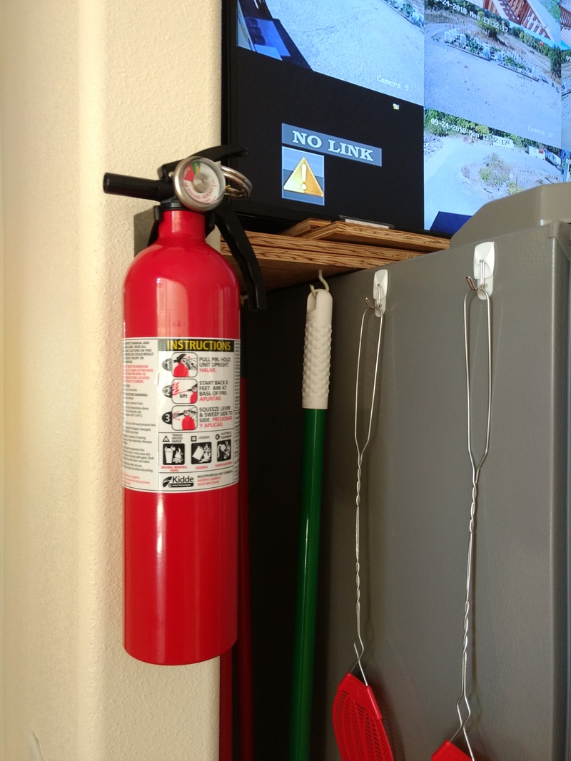 Fire Extinguisher next to Ruby the Fridge.