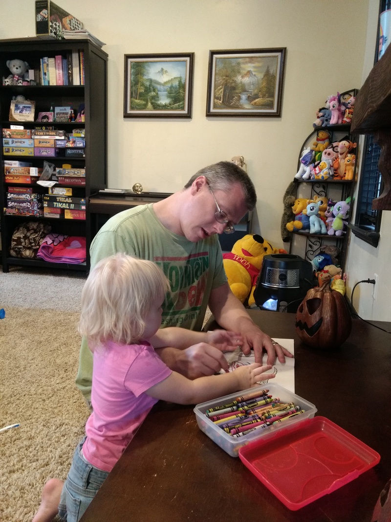 Ben and little angel like to color together.