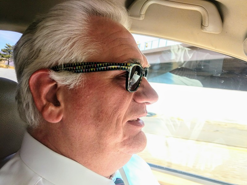 Don drives from Willard to Herriman sporting Lois's sunglasses.