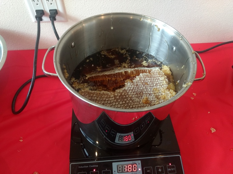 Melting the honeycomb at 180F. Pot #1.