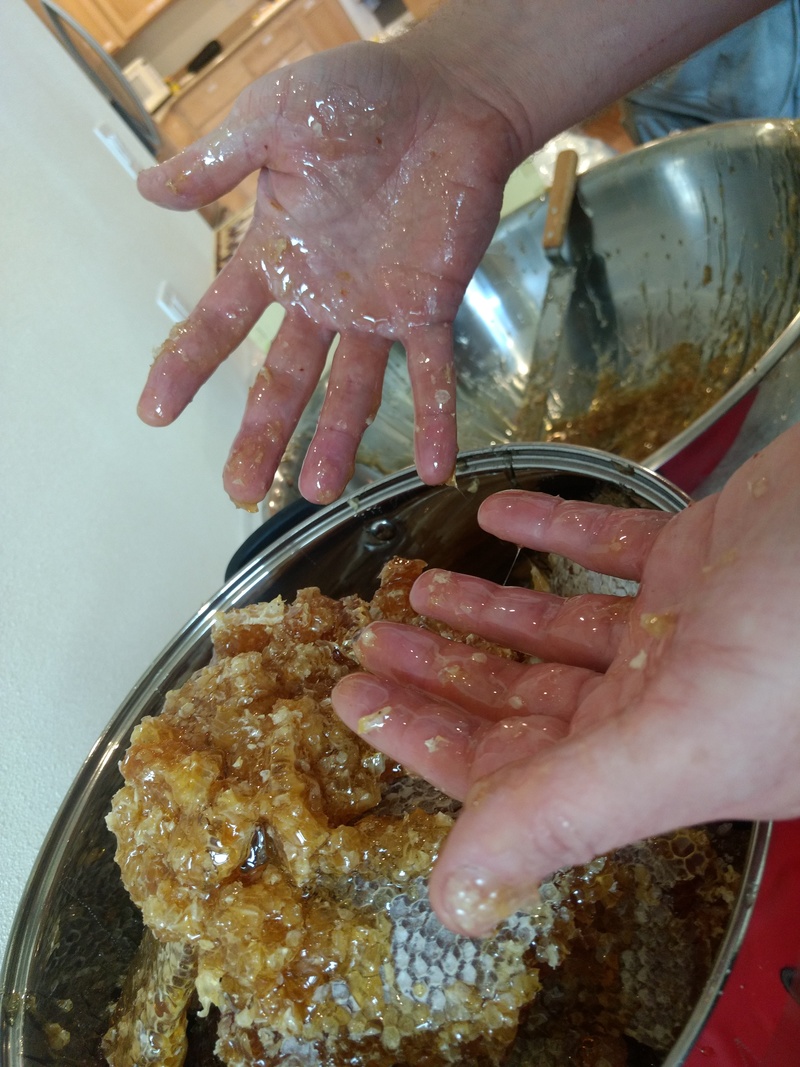 Joseph's hands are covered in honey.
