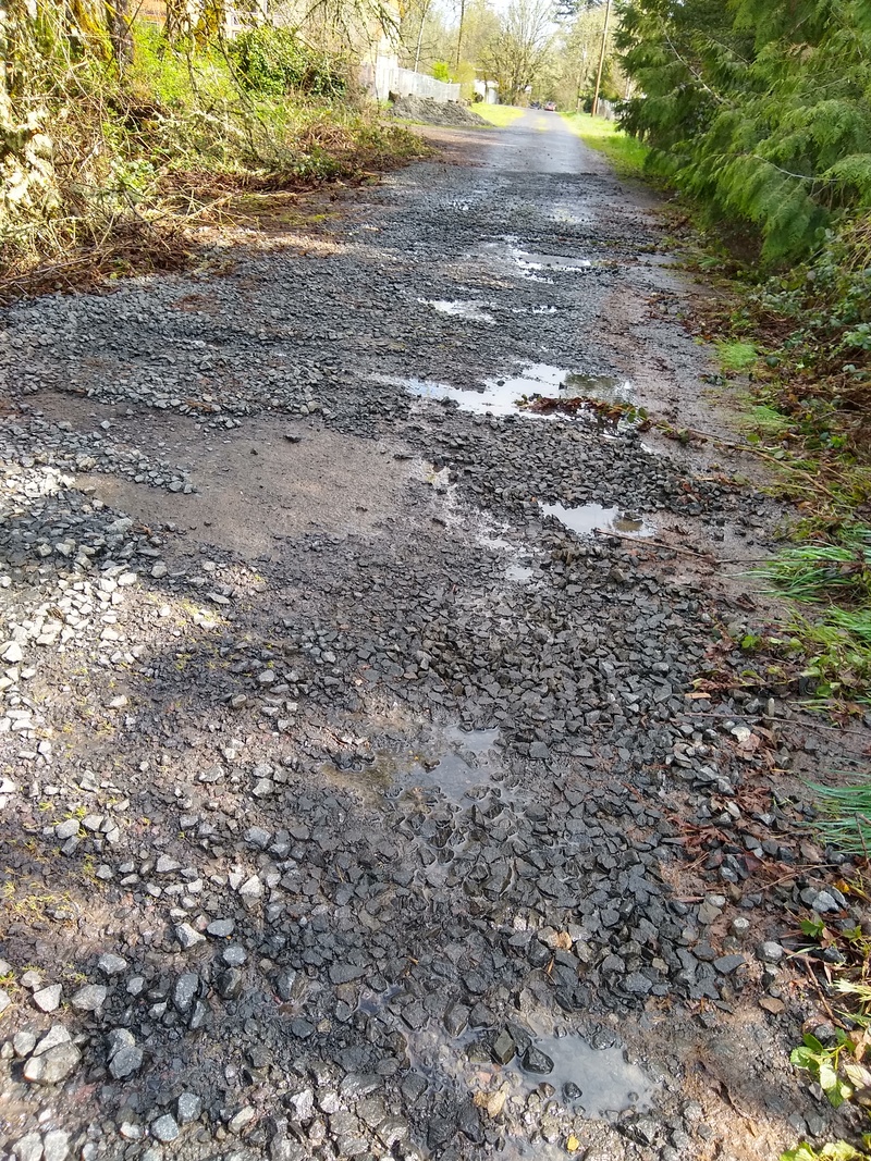 Tue 10:57 exposed roadbed including asphalt that we did not know about.