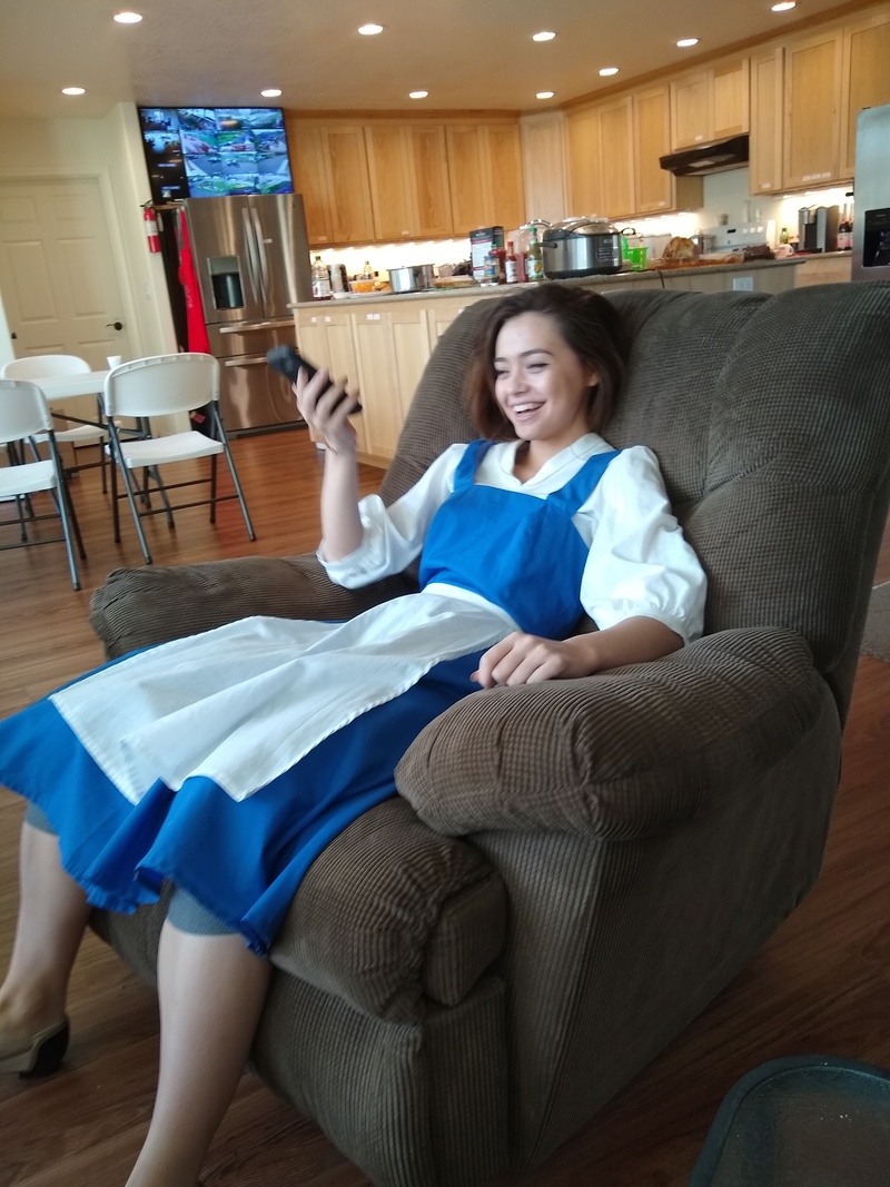 Belle is reading a book, modern style.