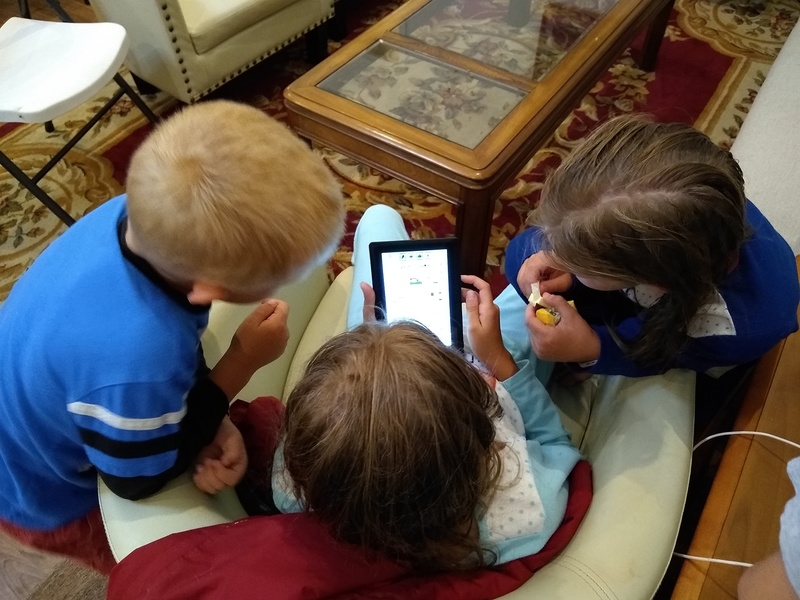 playing a game on their device.