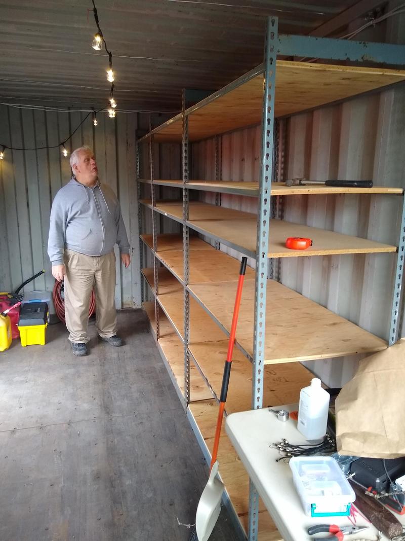 The shelves are moved to the new container (B-Con).
