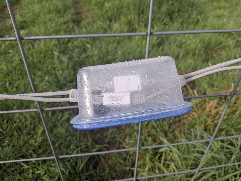 Water-resistance using food storage tubs, added after the first set of connectors failed in a rain storm.