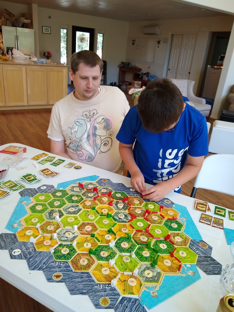 We played a game of Settlers of Catan. Every time a nine rolled, Kili got 9-12 cards. Lois got zero and Isaac got one. Our numbers weren't rolling, but nines were. He was kili-ing us.