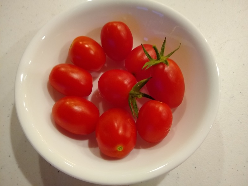 our first crop of Juliet Cherry tomatoes bigger than one or two.