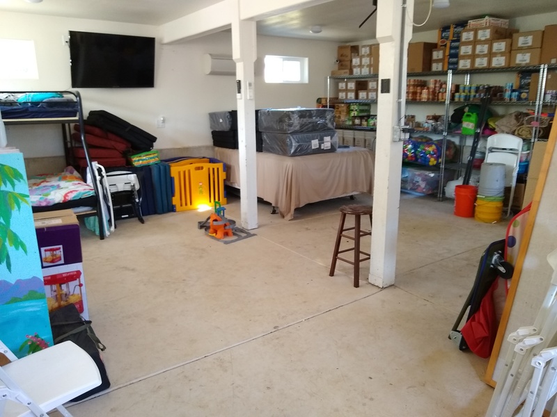 part of the garage after taking out tables and moving saws, cabinets, and other things.
