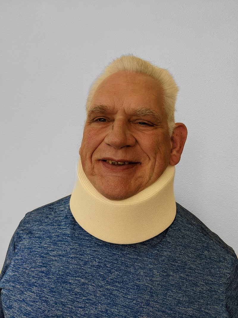 Don shows off his new neck brace. We shall see if it does any good. (Update: not much.)