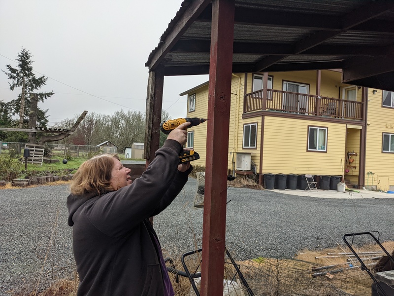 Lois installs another WCO outdoor camera. Drilling phase.