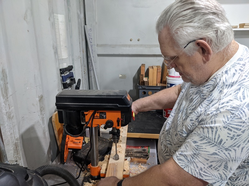 Don decided to make chair foot holders for the great room closet. 1.25 inch holes 0.5 inches deep, spaced 2.5 inches on center.