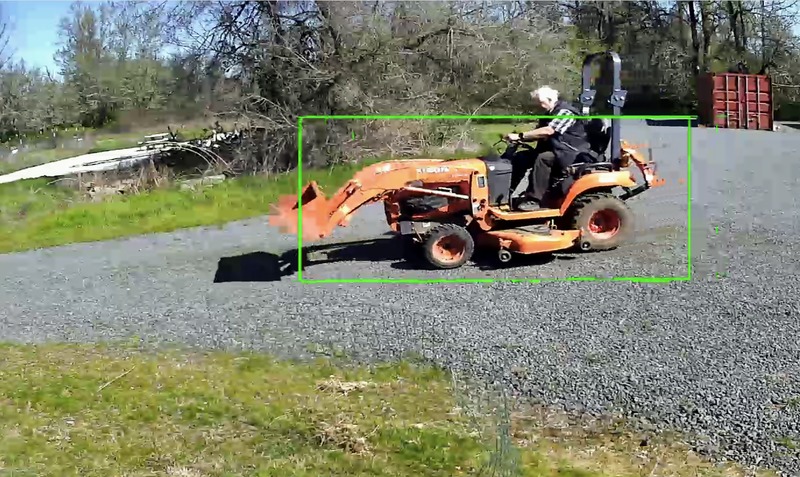 Dennis driving the tractor.