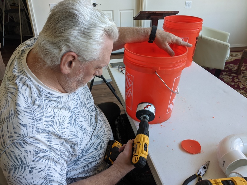 A much larger hole saw (3.5 inch) is used to cut into the five-gallon buckets.  3.5 inches is about perfect for a 3.0 inch elbow.