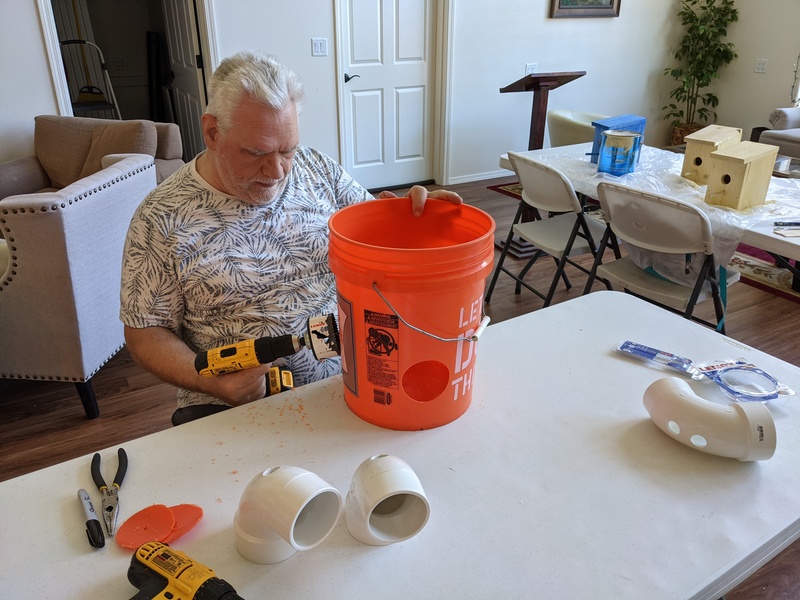 Don making a new feed bucket for King Arthur while he is in the Chickery.