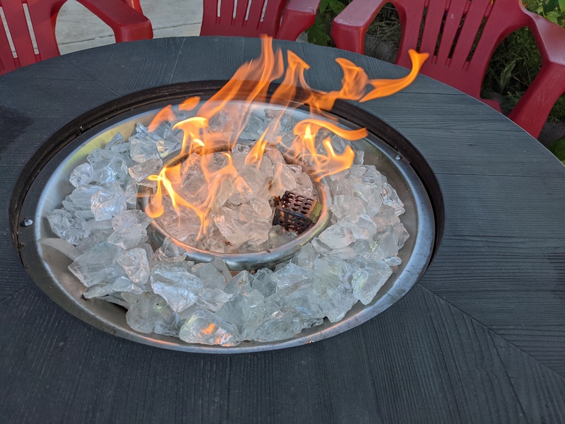 Not the Olympic Torch. Just a propane fire pit for Memorial Day hot dogs and marshmallows.