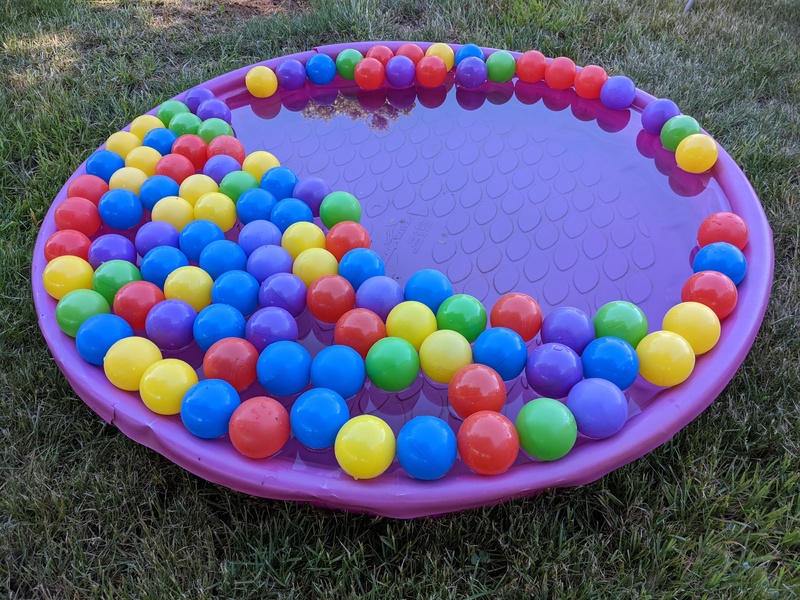 Lois filled the kiddie pool with balls for Memorial Day.