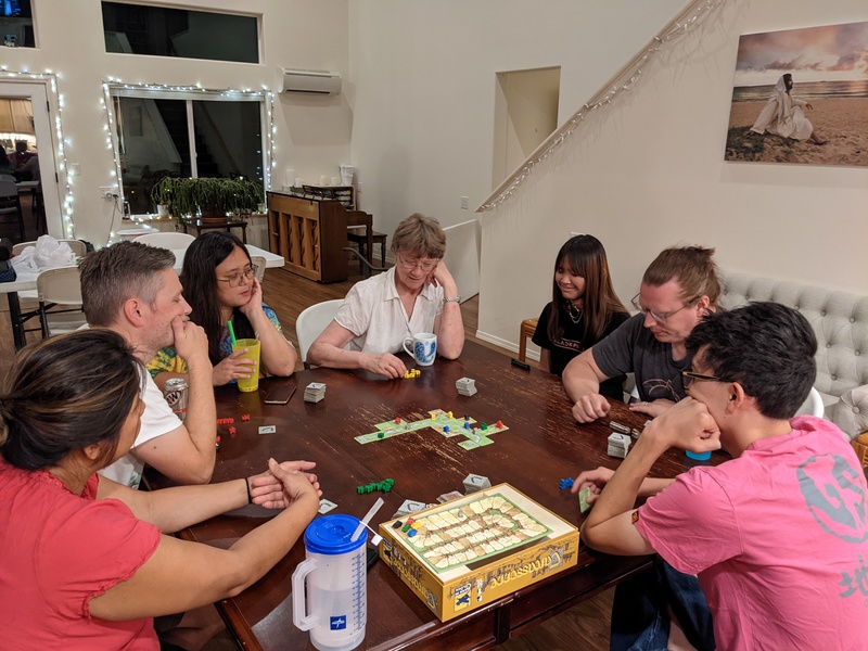 Our new table is being used for a great game of Carcassonne.