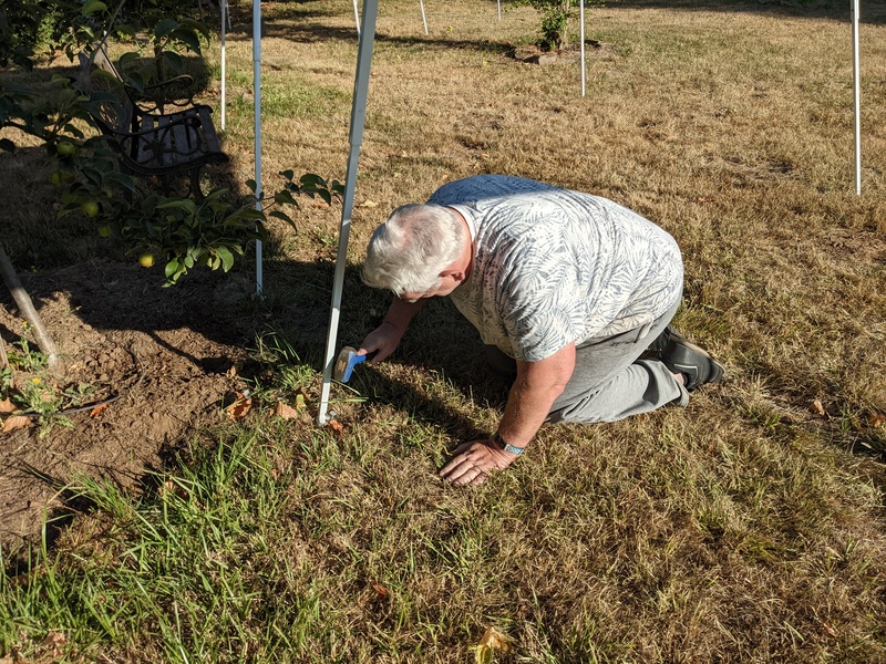 Don is hammering the nails in.