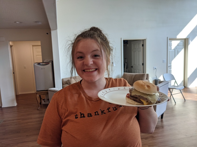 Sister Missionary with her first double cheeseburger ever.