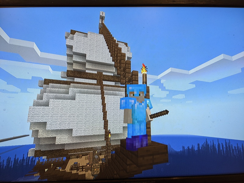Larissa made a lovely ship in Minecraft this week. That's Lois standing on the bow.