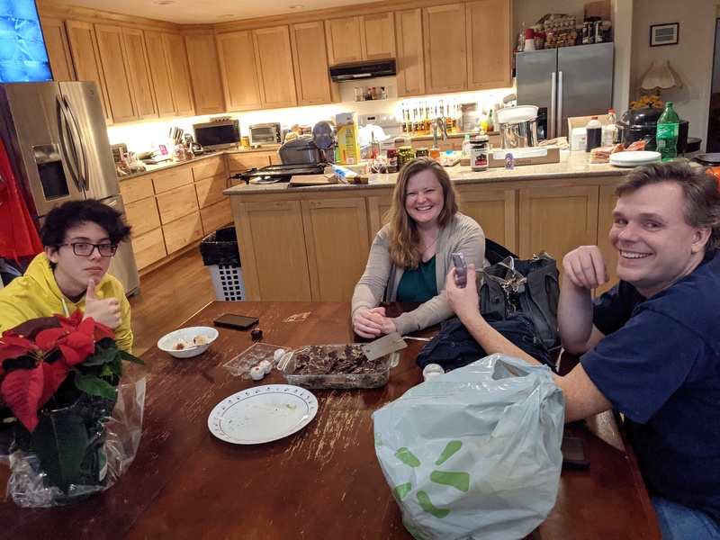 Mikey, Camille, and Joseph enjoying fudge after a cooking session.