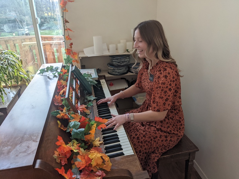 Sister Hill playing the piano.