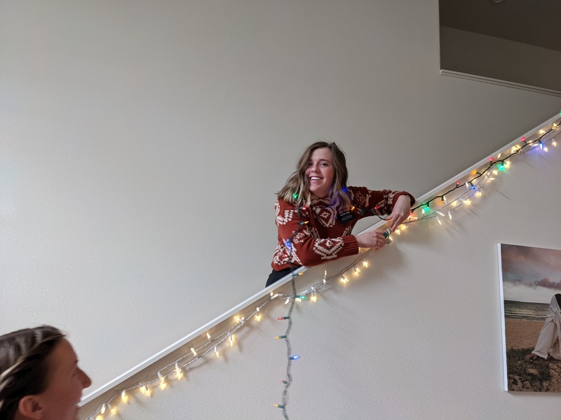 Sister Hill and Sister Earl putting up lights.