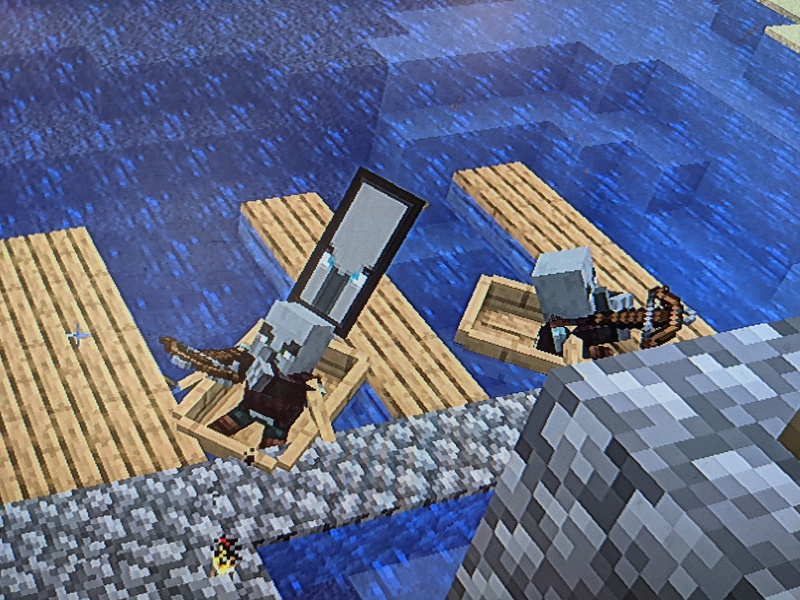 In Minecraft a new upload came out. The first difference I noticed were pillagers stuck in a boat. I laughed and so far I have left them there.
