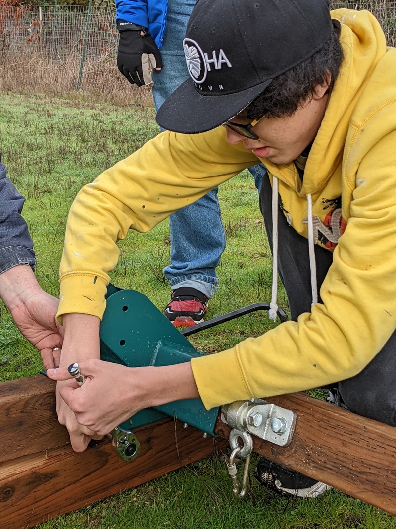 Mikey tightening the nut.