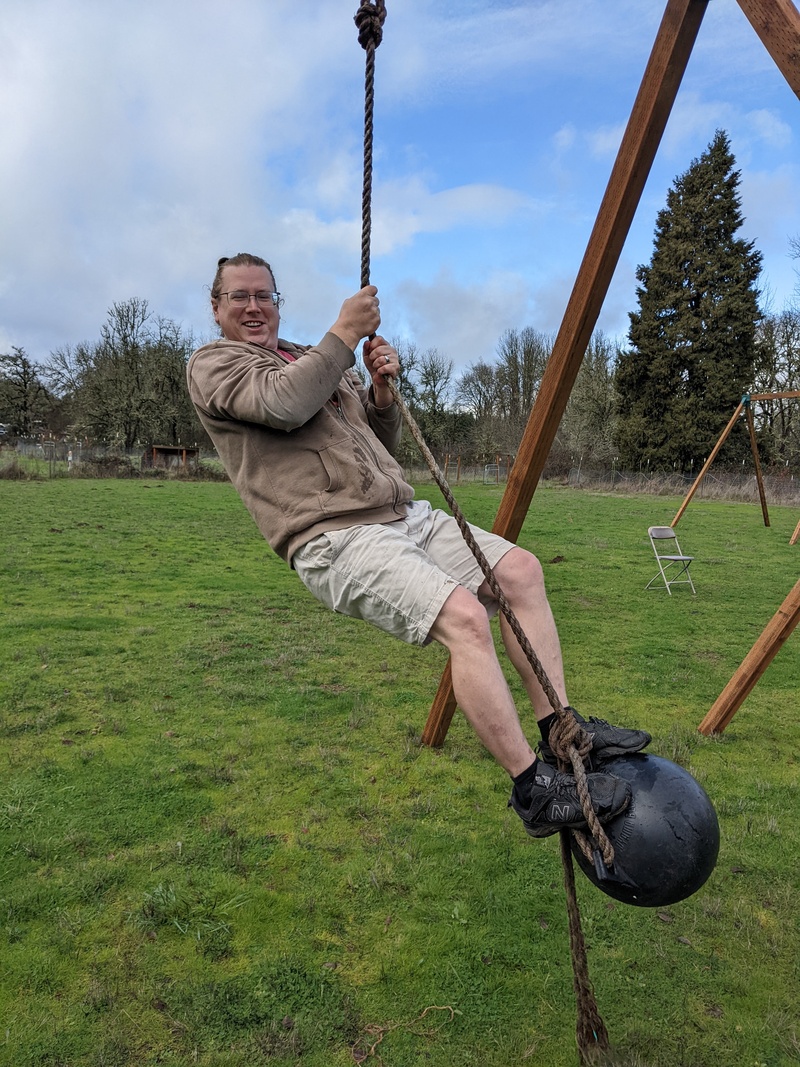 Ben standing in the float swing.