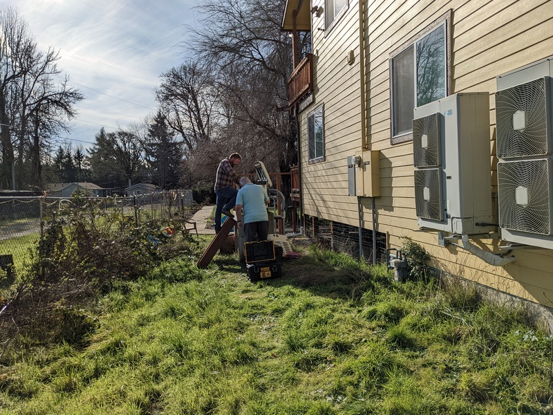 Don and Scott are analyzing the generator to see why it stopped running after an hour. This is also the "before" for the East garden.