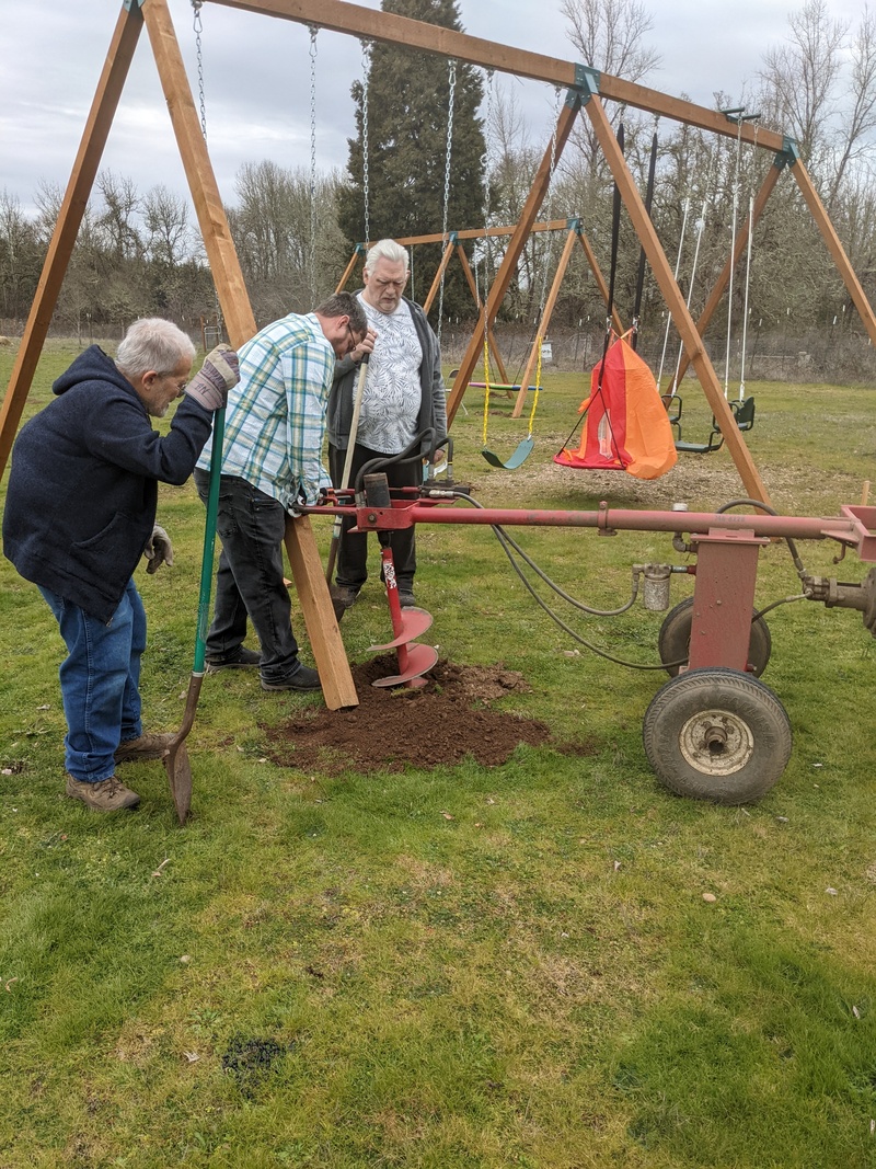 Swing set hole drilling: Lee, Rob, Don.