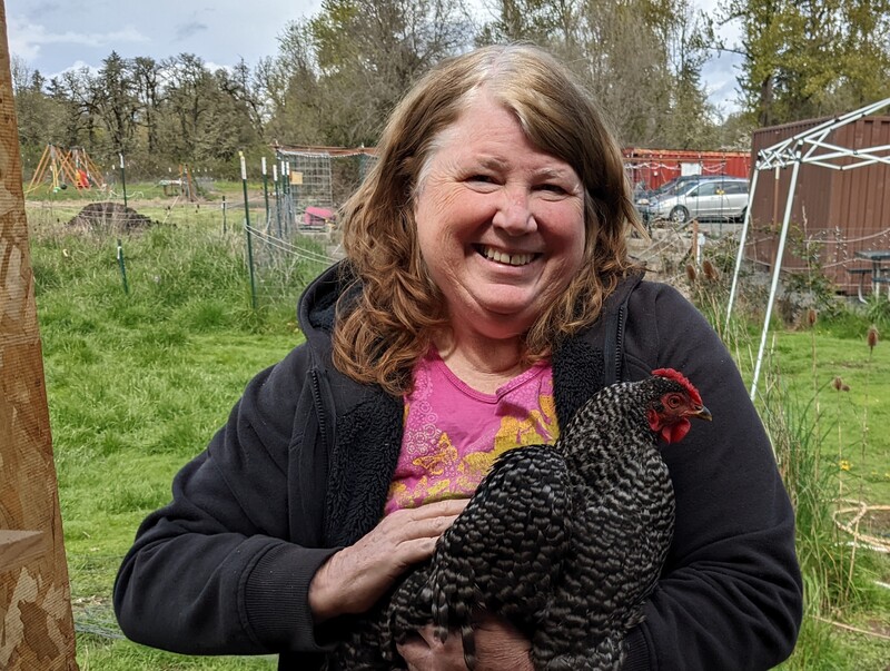 Lois holding Dominique.