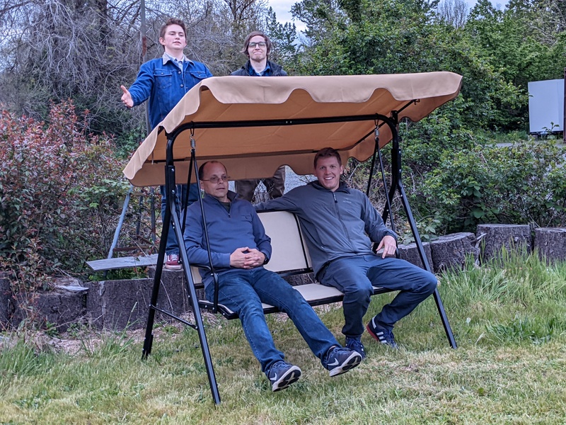 Here are three leaders and one awesome youth that stayed working on the canopy swing until the end.