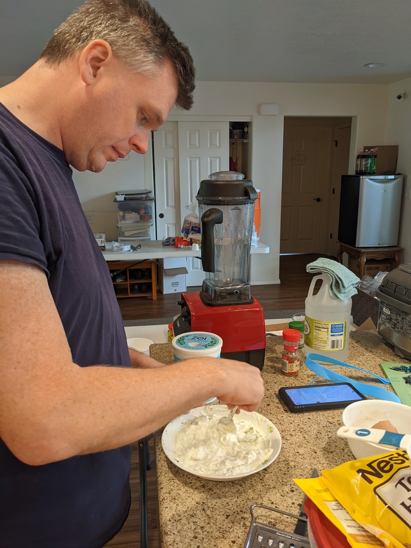 Joseph making tatraziki.