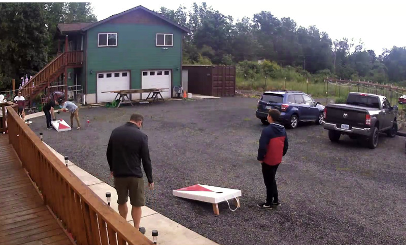 Airbnb guests playing corn row.