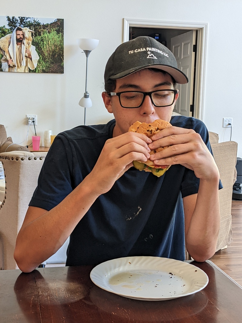 Mikey eating 4th of July Burger.