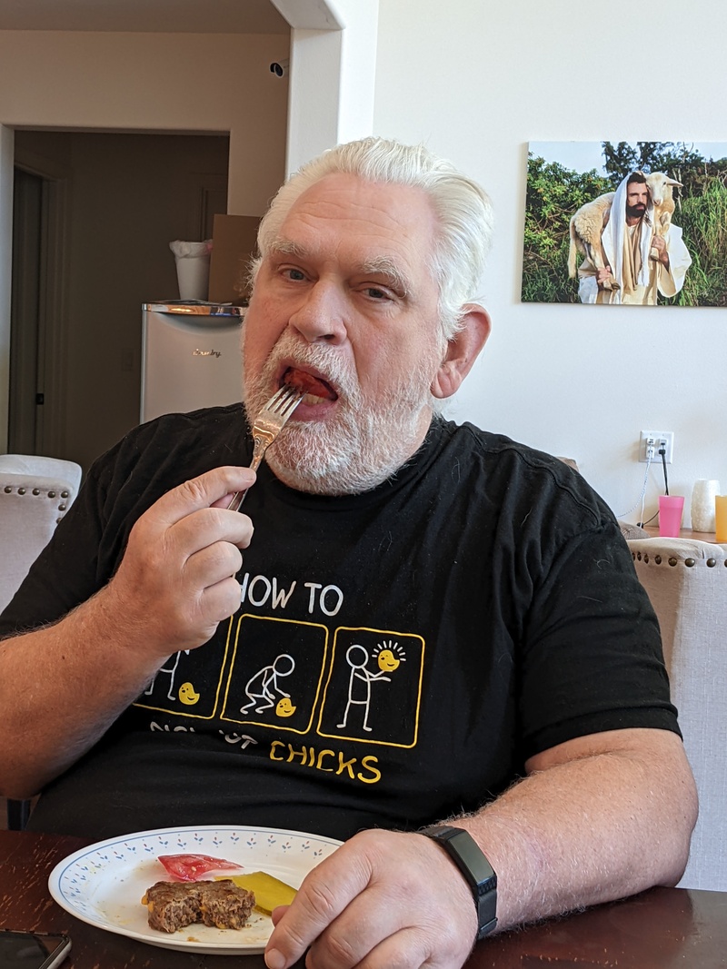 Don eating 4th of July Burger.